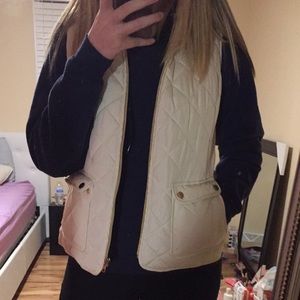 white puffy vest
